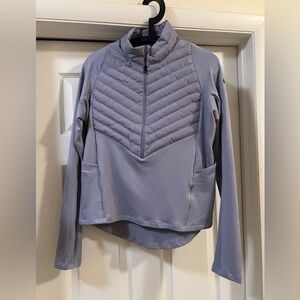 Nike half zip running pullover top with padded front and back center piece